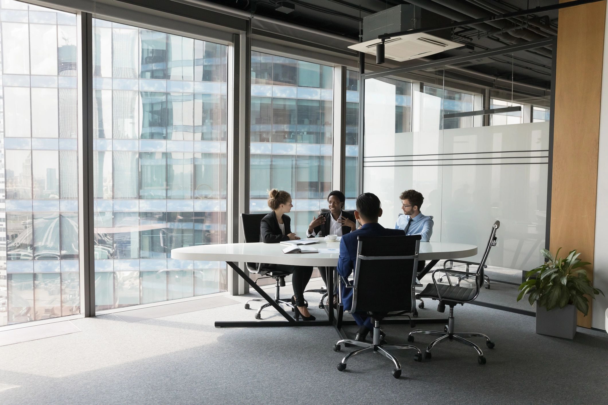 AD Media Group team meeting in a modern office